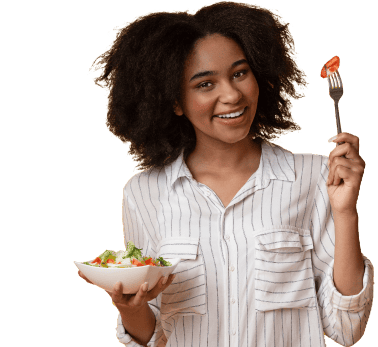 young woman holding a delicious salad bowl